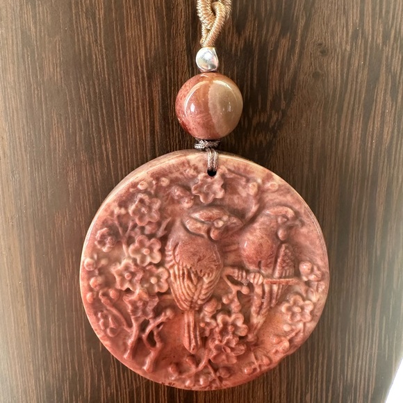 Jewelry - Coral Fossil Carved Round Bird Pendant Necklace on Tan Adjustable Rope